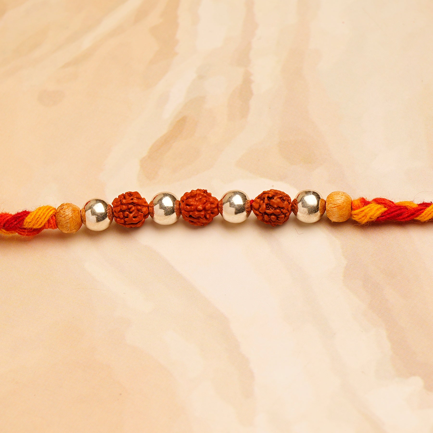 Rudraksh Silver Rakhi with Ferrero Rocher 200 GM 