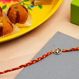 Ganesha Silver Rakhi with Besan Ladoo