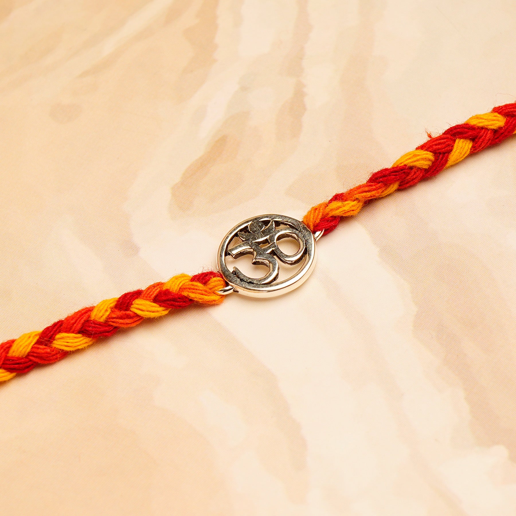 Shree OM Silver Rakhi with Hersheys Kisses Dark n Almonds Chocolate 100 GM