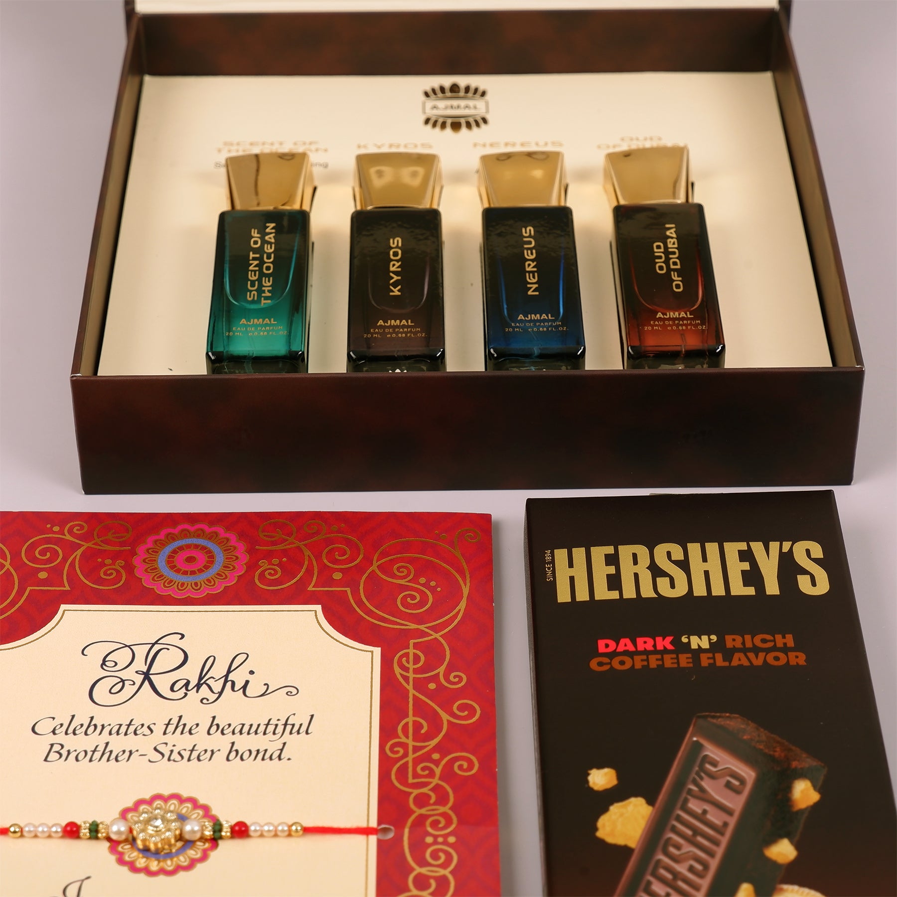 Oud Of Dubai Perfume with Rakhi Greeting Card and Hersheys Coffee Bar