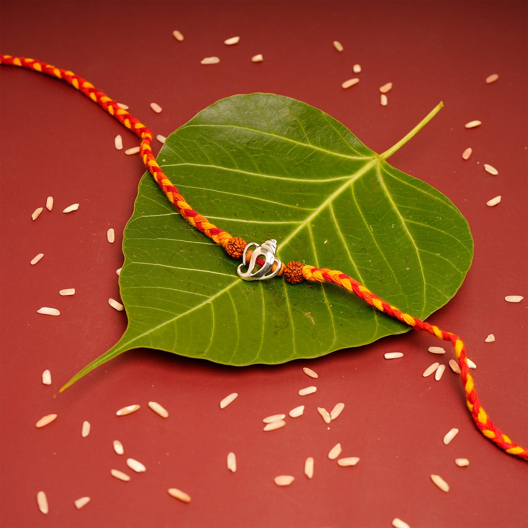 Rudraksh Ganesha Premium Silver Rakhi