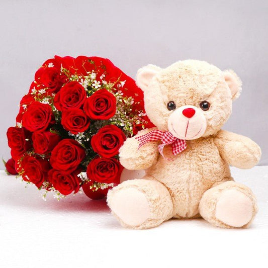 12 Red Roses in Paper Packing- Teddy Bear (12 inches)