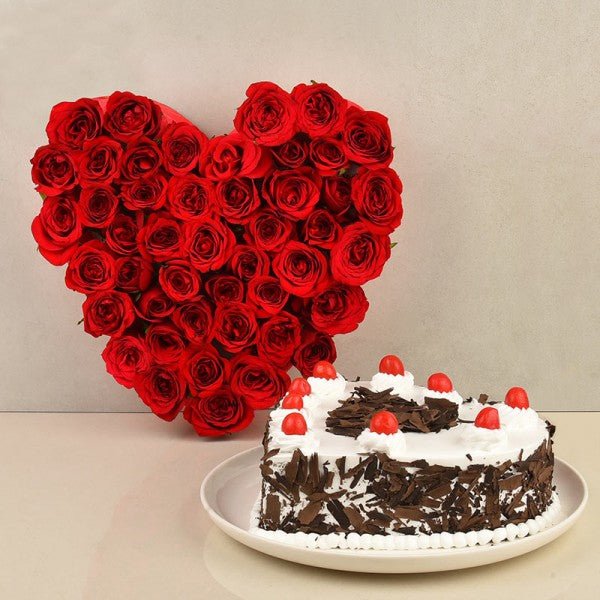 Heart Shaped Arrangement of 50 Red Roses - 1 Kg Heart Shape Black Forest Cake