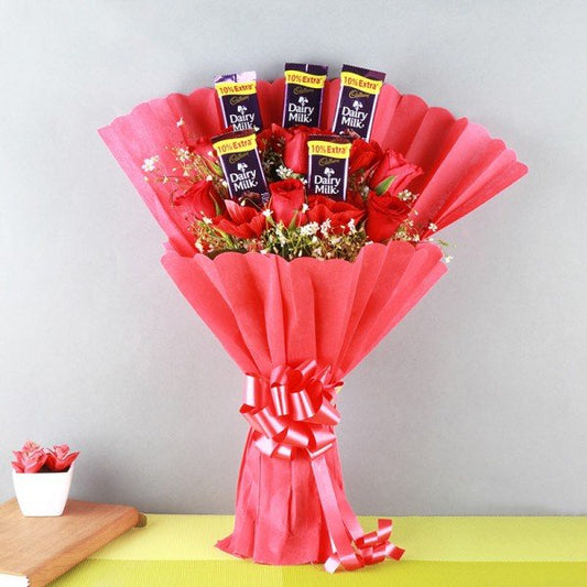 Bouquet Of 6 Red Roses And 5 Dairy Milk (13.2 Gm) Chocolates