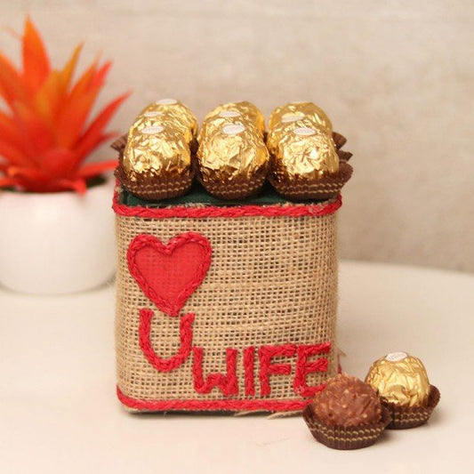 9 Ferrero Rocher In Glass Vase Wrapped With Jute Packing