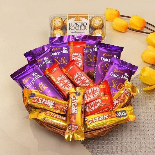 5 Kitkat (13.2Gms Each) - 5 5Star (22.4Gms Each) - 6 Dairymilk Silk (60 Gms Each) - 16Pcs Ferrero Rochers (200Gms) - Basket