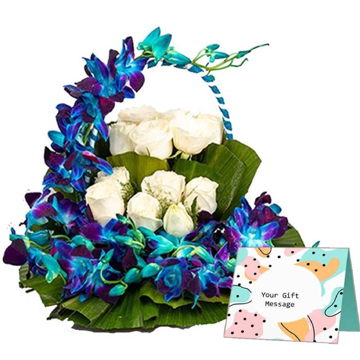 White Roses with Orchid Handle Basket Arrangement